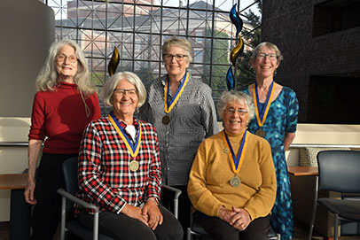 Group of smiling people Links to Over age 70. 