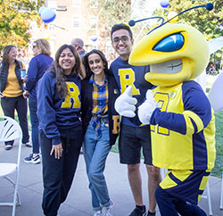 Happy students with mascot
